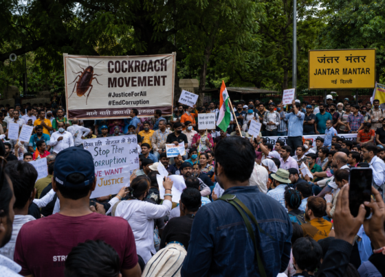 Jantar Mantar Delhi protests July 2026 with a large crowd gathered near the iconic Jantar Mantar sign, protesters holding placards and Indian flags during the latest Cockroach Movement demonstration in New Delhi.