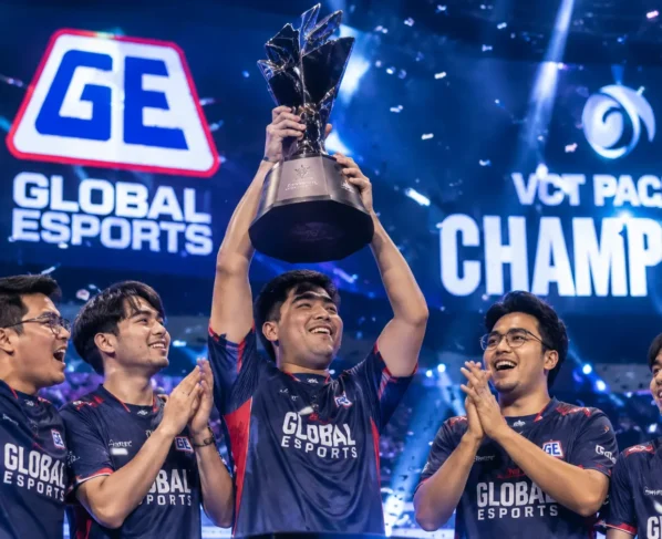 Global Esports players celebrate their VCT Pacific Championship victory as the team captain lifts the championship trophy on stage amid confetti